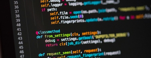 a computer monitor showing a few lines of code